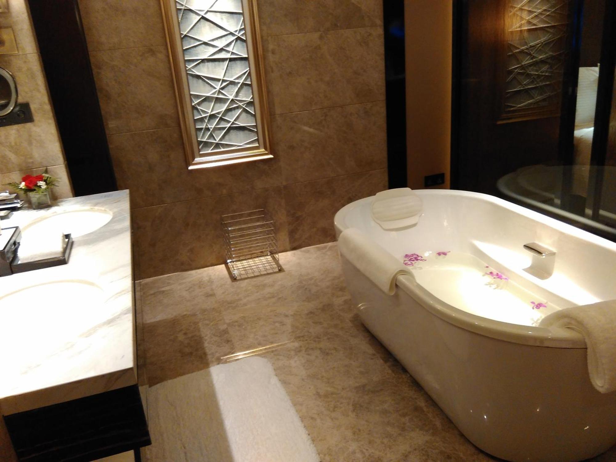 Wanda Realm Hotel Dongying Rum bild