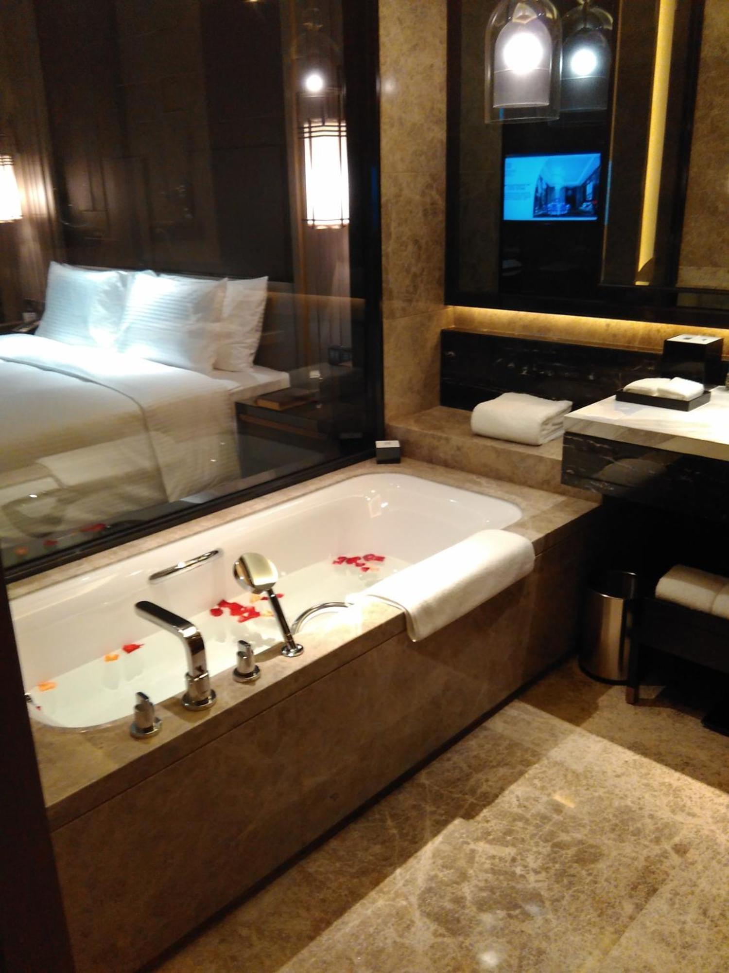 Wanda Realm Hotel Dongying Rum bild