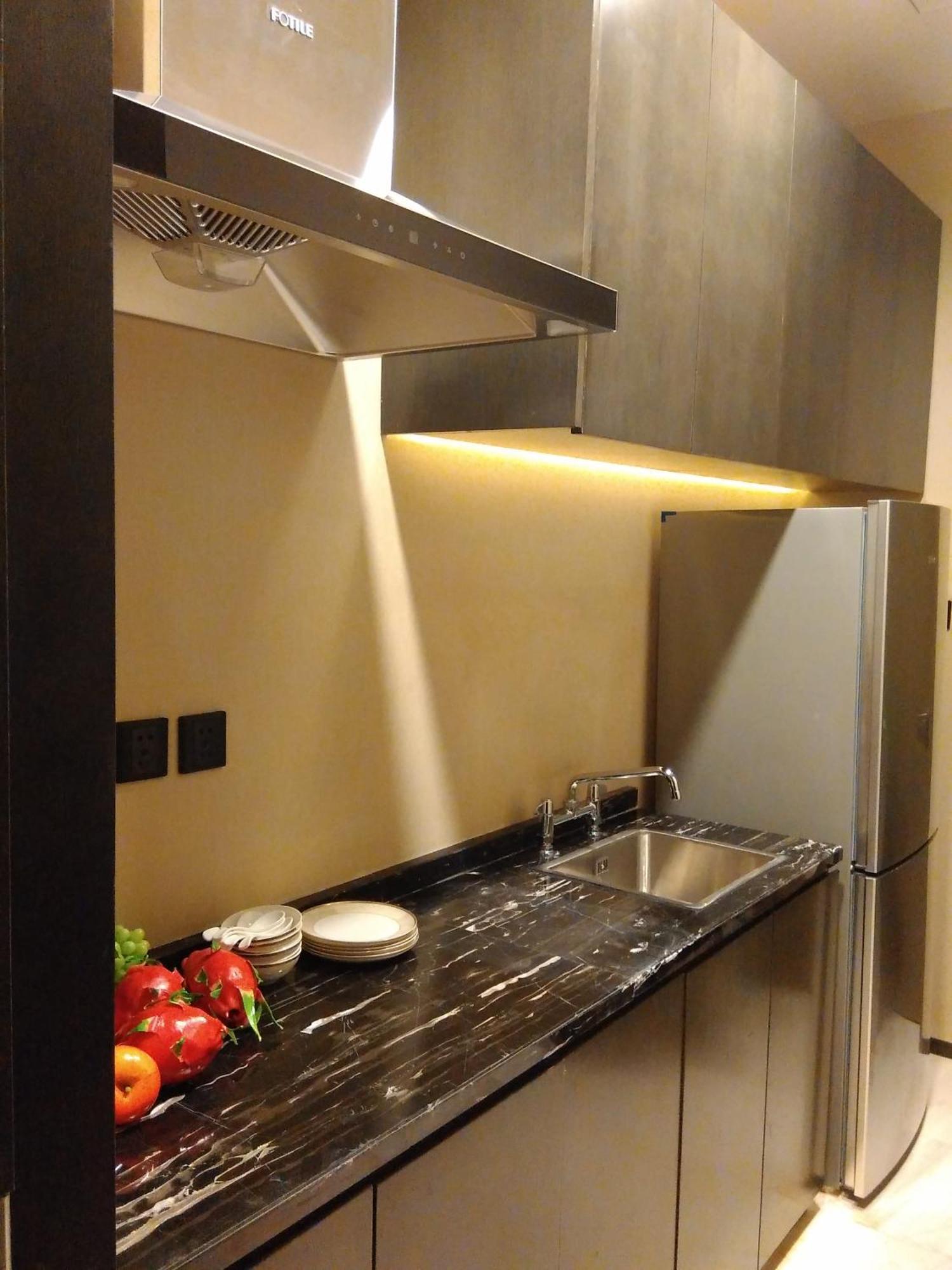 Wanda Realm Hotel Dongying Rum bild