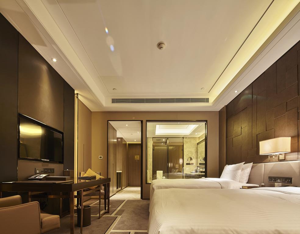 Wanda Realm Hotel Dongying Rum bild