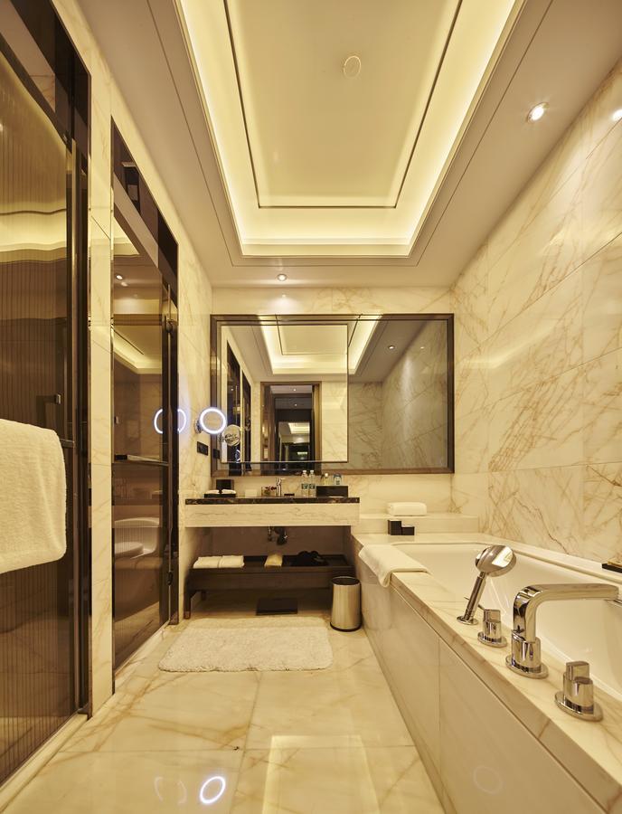 Wanda Realm Hotel Dongying Rum bild