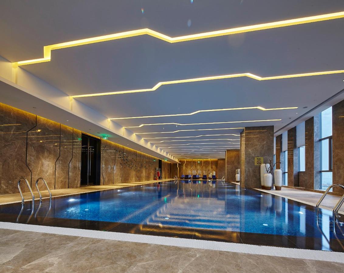 Wanda Realm Hotel Dongying Exteriör bild
