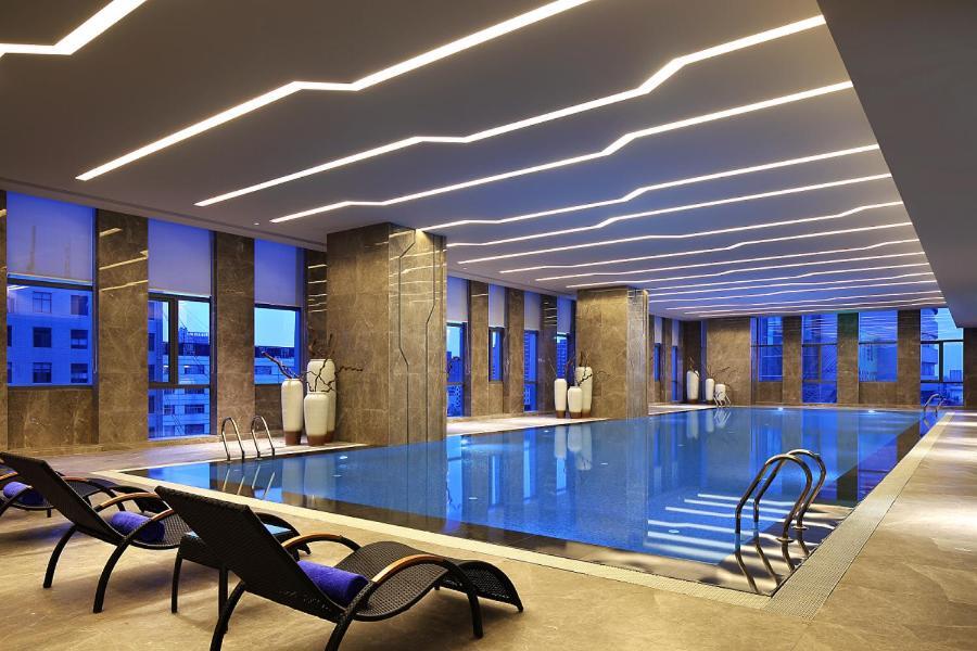Wanda Realm Hotel Dongying Exteriör bild
